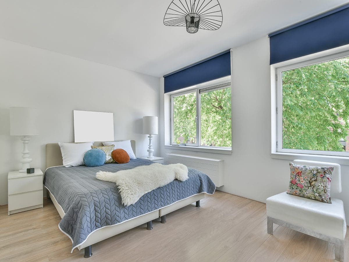 Bedroom with window treatments