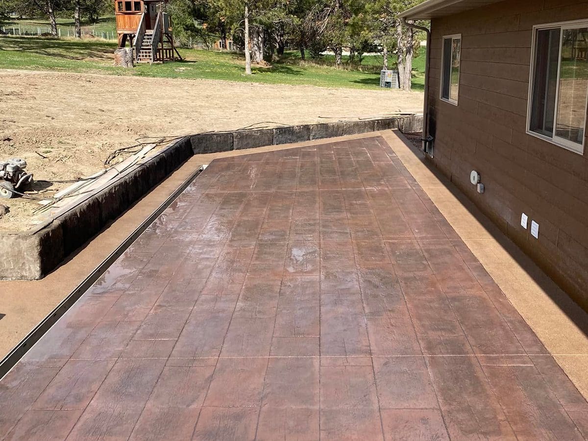 Stamped patio concrete stamped brick red with border
