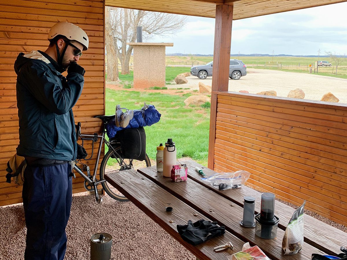 Taking a break from bikepacking in a shelter