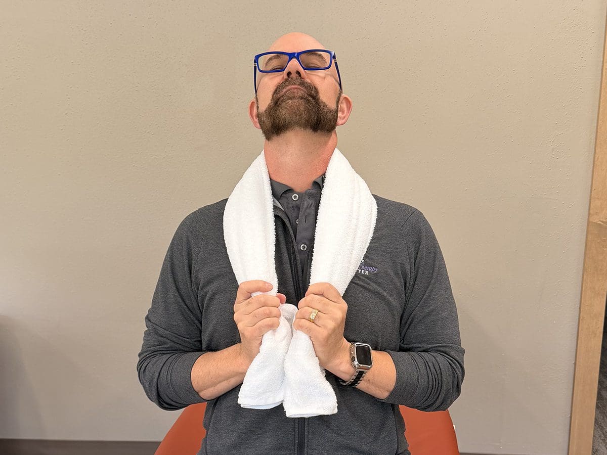 Towel Cervical Extension Mobilization stretch