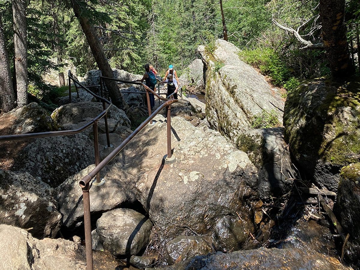 Sunday Gulch Trail over boulders with rails