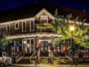 alpine inn front door at night 1 300x225
