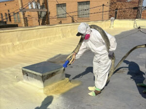 machine gun spray foam commerical roof 300x225