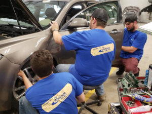 roys westside auto body hanging door 1 300x225