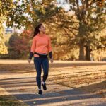 woman walking during fall