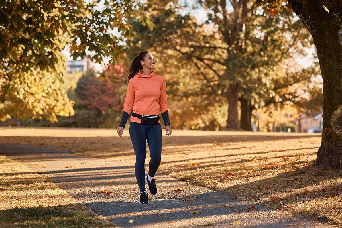 woman walking during fall