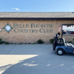 Exterior of building and sign of Belle Fourche Country Club