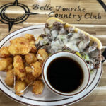 Philly sandwich with cheese curds and au jus at Belle Fourche Country club