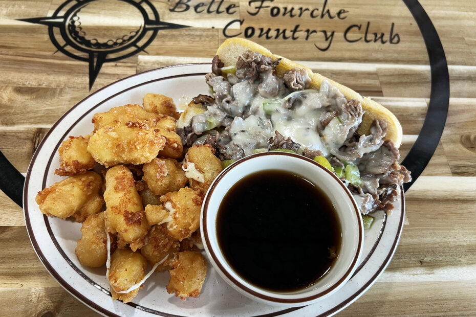Philly sandwich with cheese curds and au jus at Belle Fourche Country club