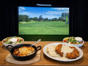 clubhouse of spearfish food and golf simulator 300x225