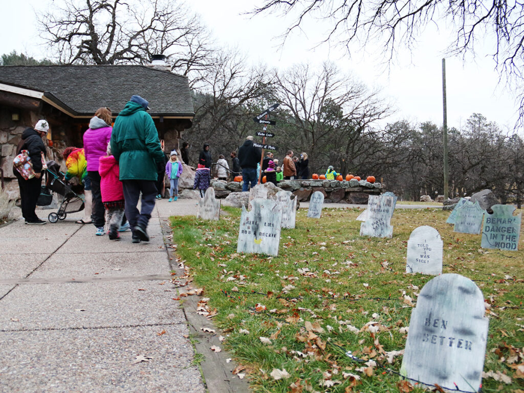 Families on halloween night hike at custer state park