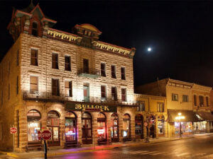 historic bullock hotel outside at night 300x225