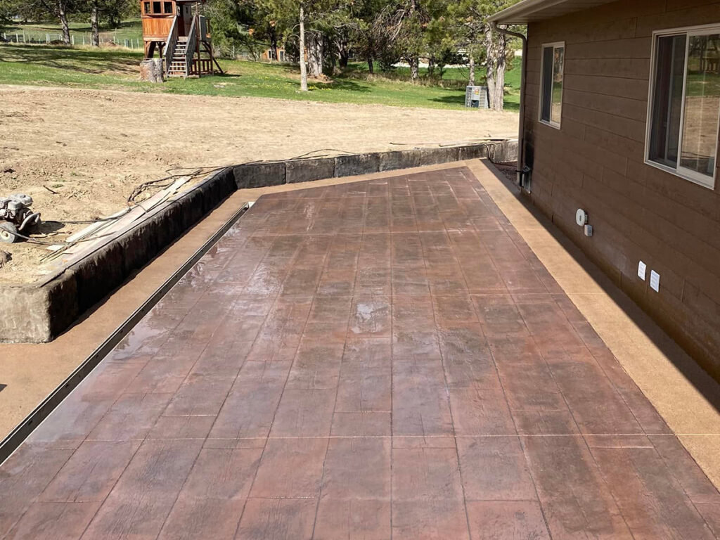 Stamped patio concrete stamped brick red with border