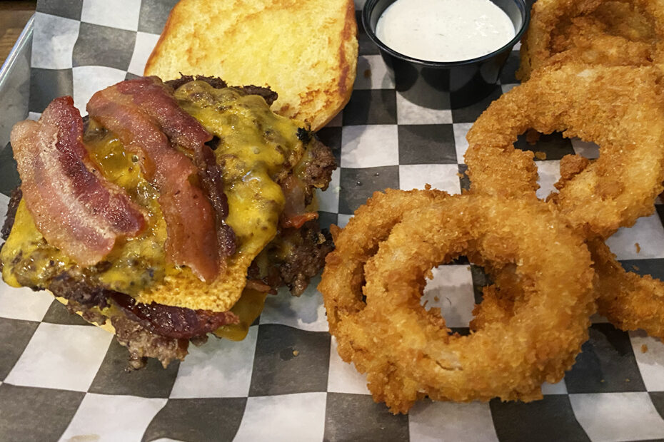 The Social House Rapid City bacon cheeseburger with onion rings