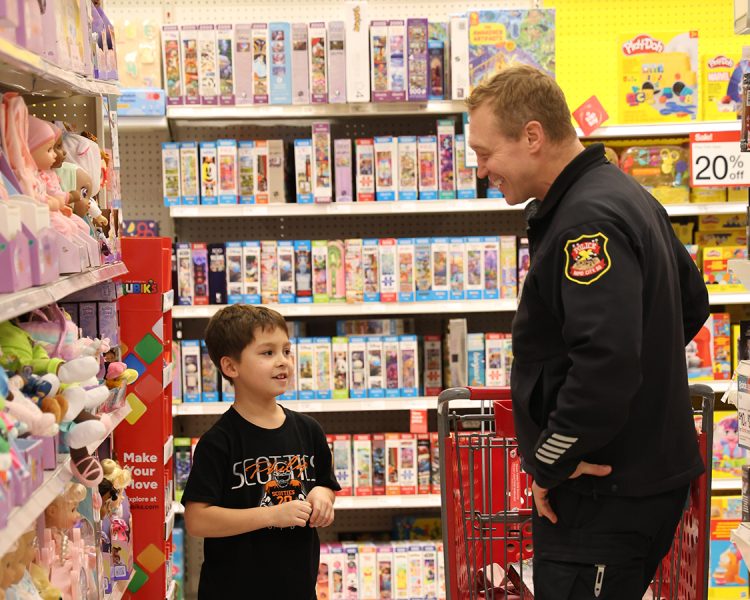 Shopping with a police officers for badges 'n Christmas in Rapid City